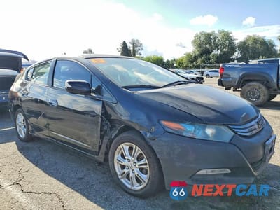 Czwarte zdjęcie samochodu z boku: 2010 HONDA INSIGHT EX VIN:JHMZE2H77AS022670 - miniatura