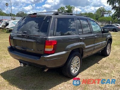 Czwarte zdjęcie samochodu z boku: 2004 JEEP GRAND CHEROKEE LIMITED VIN:1J4GW58S14C372462 - miniatura