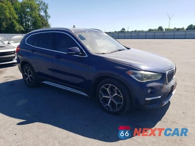 Czwarte zdjęcie samochodu z boku: 2017 BMW X1 XDRIVE28I VIN:WBXHT3C34H5F84053 - miniatura