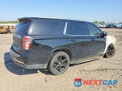 Trzecie zdjęcie samochodu z tyłu: 2021 CHEVROLET TAHOE C1500 LT VIN:1GNSCNKD6MR155352 - miniatura