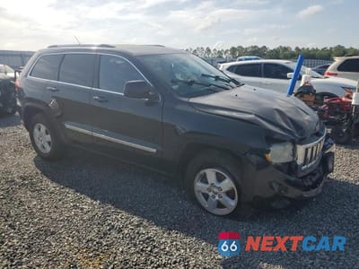 Czwarte zdjęcie samochodu z boku: 2011 JEEP GRAND CHEROKEE LAREDO VIN:1J4RR4GG7BC552534 - miniatura