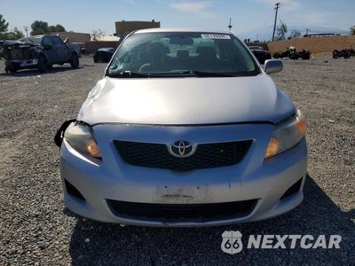 Piąte zdjęcie samochodu w środku: 2010 TOYOTA COROLLA LE VIN:JTDBU4EE7AJ066680 - miniatura