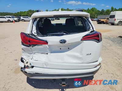 Zdjęcie 6 z 13 samochodu: 2016 TOYOTA RAV4 XLE VIN:JTMWFREV1GD082633 - miniatura