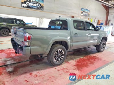 Trzecie zdjęcie samochodu z tyłu: 2022 TOYOTA TACOMA DOUBLE CAB VIN:3TMCZ5AN1NM471332 - miniatura