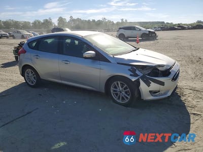 Czwarte zdjęcie samochodu z boku: 2017 FORD FOCUS SE VIN:1FADP3K2XHL267109 - miniatura