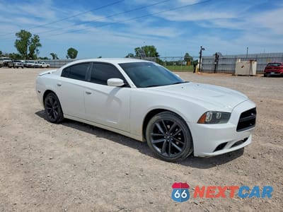 Czwarte zdjęcie samochodu z boku: 2014 DODGE CHARGER SXT VIN:2C3CDXHG8EH178239 - miniatura