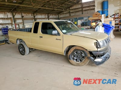 Czwarte zdjęcie samochodu z boku: 1998 NISSAN FRONTIER XE VIN:1N6DD26S7WC313092 - miniatura