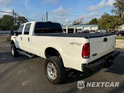 Trzecie zdjęcie samochodu z tyłu: 2004 FORD F350 SRW SUPER DUTY VIN:1FTSW31P74ED34393 - miniatura