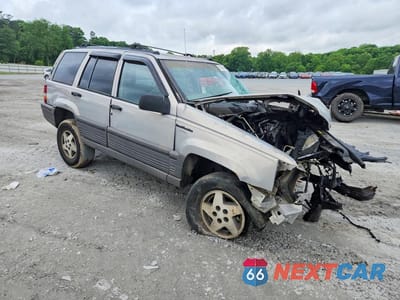 Czwarte zdjęcie samochodu z boku: 1995 JEEP GRAND CHEROKEE LAREDO VIN:1J4GZ58Y0SC553643 - miniatura