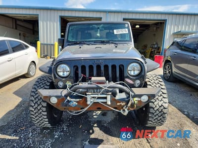 Piąte zdjęcie samochodu w środku: 2016 JEEP WRANGLER UNLIMITED SPORT VIN:1C4BJWDG7GL254975 - miniatura