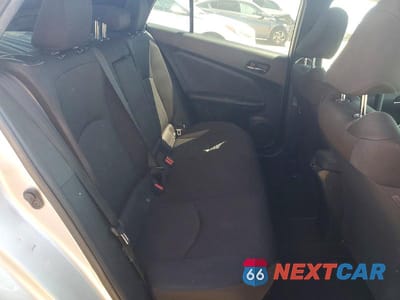 Zdjęcie 10 z 12 samochodu: 2021 TOYOTA PRIUS L ECO VIN:JTDKAMFU7M3139747 - miniatura