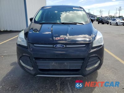 Piąte zdjęcie samochodu w środku: 2016 FORD ESCAPE SE VIN:1FMCU0GX6GUC01727 - miniatura