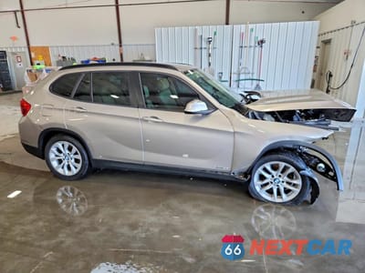Czwarte zdjęcie samochodu z boku: 2015 BMW X1 XDRIVE28I VIN:WBAVL1C50FVY27001 - miniatura