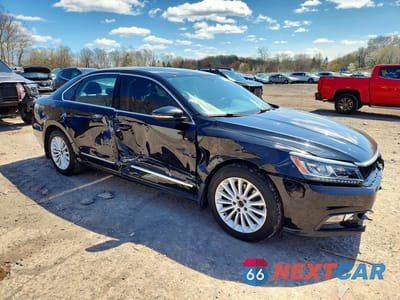 Czwarte zdjęcie samochodu z boku: 2016 VOLKSWAGEN PASSAT SE VIN:1VWBT7A31GC065284 - miniatura