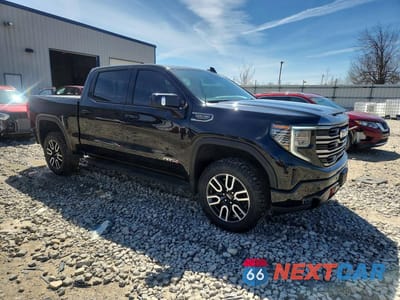 Czwarte zdjęcie samochodu z boku: 2022 GMC SIERRA K1500 AT4 VIN:1GTPUEEL7NZ546767 - miniatura