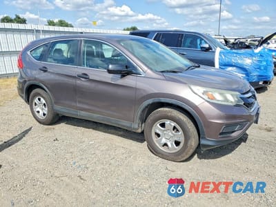 Czwarte zdjęcie samochodu z boku: 2015 HONDA CR-V LX VIN:3CZRM3H36FG700938 - miniatura