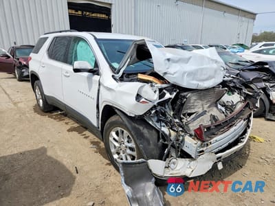 Czwarte zdjęcie samochodu z boku: 2019 CHEVROLET TRAVERSE LT VIN:1GNEVGKW4KJ124634 - miniatura