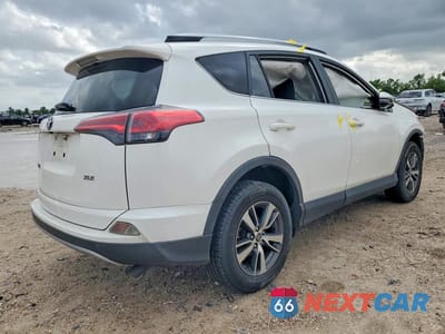 Trzecie zdjęcie samochodu z tyłu: 2018 TOYOTA RAV4 XLE VIN:JTMWFREVXJJ726154 - miniatura