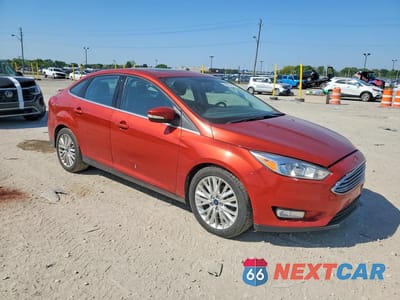 Czwarte zdjęcie samochodu z boku: 2018 FORD FOCUS TITANIUM VIN:1FADP3J2XJL277064 - miniatura