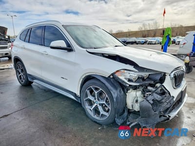 Czwarte zdjęcie samochodu z boku: 2016 BMW X1 XDRIVE28I VIN:WBXHT3C3XG5F65716 - miniatura