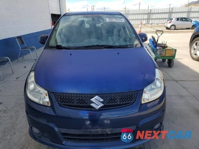 Piąte zdjęcie samochodu w środku: 2011 SUZUKI SX4 VIN:JS2YA5A58B6300995 - miniatura