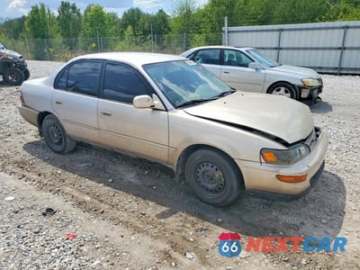 Czwarte zdjęcie samochodu z boku: 1997 TOYOTA COROLLA DX VIN:1NXBB02E6VZ514202 - miniatura