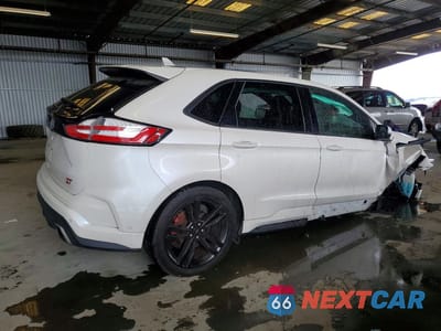Trzecie zdjęcie samochodu z tyłu: 2019 FORD EDGE ST VIN:2FMPK4AP5KBB25813 - miniatura