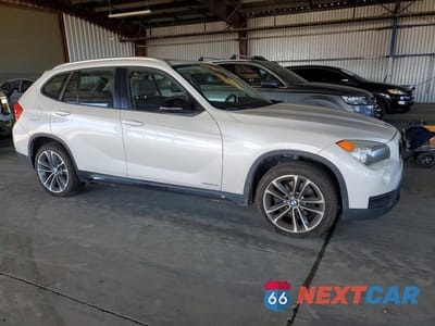 Czwarte zdjęcie samochodu z boku: 2014 BMW X1 SDRIVE28I VIN:WBAVM1C59EVW55479 - miniatura
