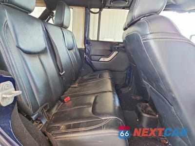 Zdjęcie 11 z 13 samochodu: 2013 JEEP WRANGLER UNLIMITED SAHARA VIN:1C4BJWEG3DL552465 - miniatura