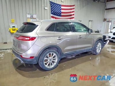 Trzecie zdjęcie samochodu z tyłu: 2019 LINCOLN MKC SELECT VIN:5LMCJ2D90KUL30367 - miniatura