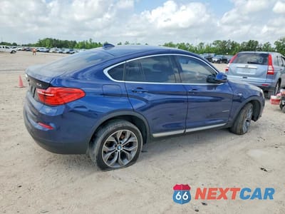 Trzecie zdjęcie samochodu z tyłu: 2015 BMW X4 XDRIVE35I VIN:5UXXW5C53F0E87822 - miniatura