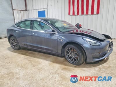 Czwarte zdjęcie samochodu z boku: 2019 TESLA MODEL 3 VIN:5YJ3E1EA0KF431528 - miniatura