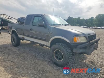 Czwarte zdjęcie samochodu z boku: 2002 FORD F150 VIN:1FTRX18L12NA53383 - miniatura