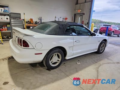 Trzecie zdjęcie samochodu z tyłu: 1996 FORD MUSTANG VIN:1FALP4443TF195578 - miniatura