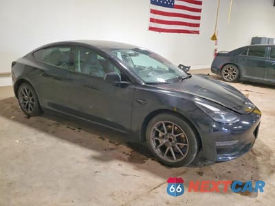 Czwarte zdjęcie samochodu z boku: 2022 TESLA MODEL 3 VIN:5YJ3E1EA5NF370200 - miniatura