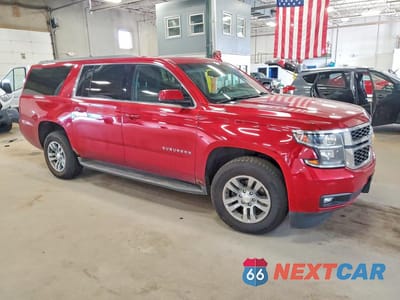 Czwarte zdjęcie samochodu z boku: 2015 CHEVROLET SUBURBAN K1500 LT VIN:1GNSKJKC6FR604650 - miniatura