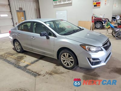 Czwarte zdjęcie samochodu z boku: 2016 SUBARU IMPREZA PREMIUM VIN:JF1GJAB62GH012431 - miniatura