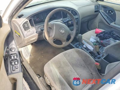 Zdjęcie 8 z 12 samochodu: 2004 HYUNDAI ELANTRA GLS VIN:KMHDN46DX4U827308 - miniatura