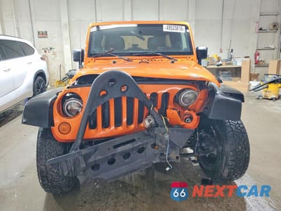 Piąte zdjęcie samochodu w środku: 2011 JEEP WRANGLER UNLIMITED RUBICON VIN:1J4BA6H1XBL520174 - miniatura