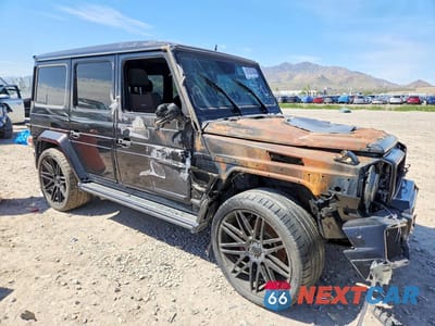 Czwarte zdjęcie samochodu z boku: 2013 MERCEDES-BENZ G 63 AMG VIN:WDCYC7DF2DX212388 - miniatura