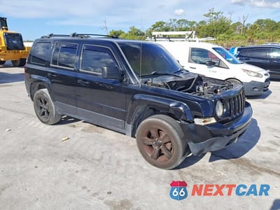 Czwarte zdjęcie samochodu z boku: 2014 JEEP PATRIOT SPORT VIN:1C4NJPBA3ED703755 - miniatura