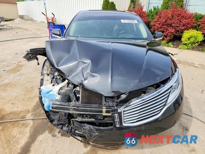 Piąte zdjęcie samochodu w środku: 2015 LINCOLN MKZ VIN:3LN6L2J9XFR607215 - miniatura