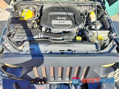 Zdjęcie 12 z 12 samochodu: 2014 JEEP WRANGLER UNLIMITED SAHARA VIN:1C4HJWEG8EL117971 - miniatura