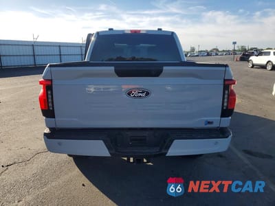 Zdjęcie 6 z 12 samochodu: 2024 FORD F150 LIGHTNING XLT VIN:1FTVW3LK1RWG31174 - miniatura