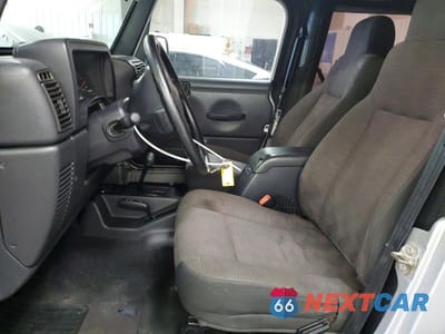 Zdjęcie 7 z 12 samochodu: 2003 JEEP WRANGLER COMMANDO/X VIN:1J4FA39SX3P374456 - miniatura