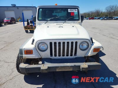 Piąte zdjęcie samochodu w środku: 2004 JEEP WRANGLER / TJ SPORT VIN:1J4F449S34P802463 - miniatura