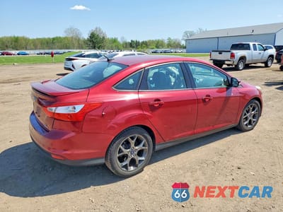 Trzecie zdjęcie samochodu z tyłu: 2013 FORD FOCUS SE VIN:1FADP3F21DL276382 - miniatura