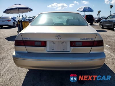 Zdjęcie 6 z 11 samochodu: 1998 TOYOTA CAMRY LE VIN:JT2BG22KXW0253116 - miniatura