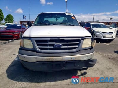 Piąte zdjęcie samochodu w środku: 2000 FORD F150 VIN:1FTPX17L2YNC24160 - miniatura