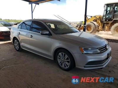 Czwarte zdjęcie samochodu z boku: 2015 VOLKSWAGEN JETTA TDI VIN:3VWLA7AJ5FM318144 - miniatura